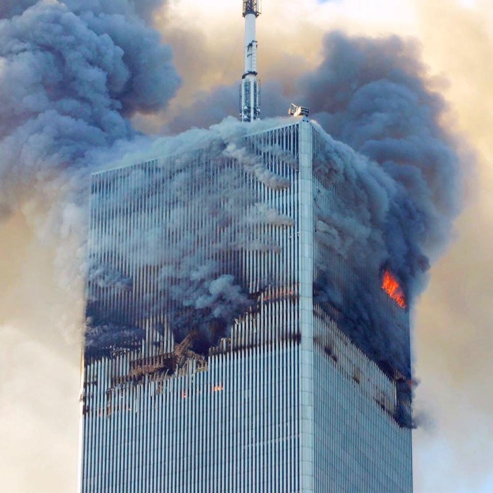 Fire and smoke rise from the north tower of the New York World Trade Center on September 11, 2001 (AP)