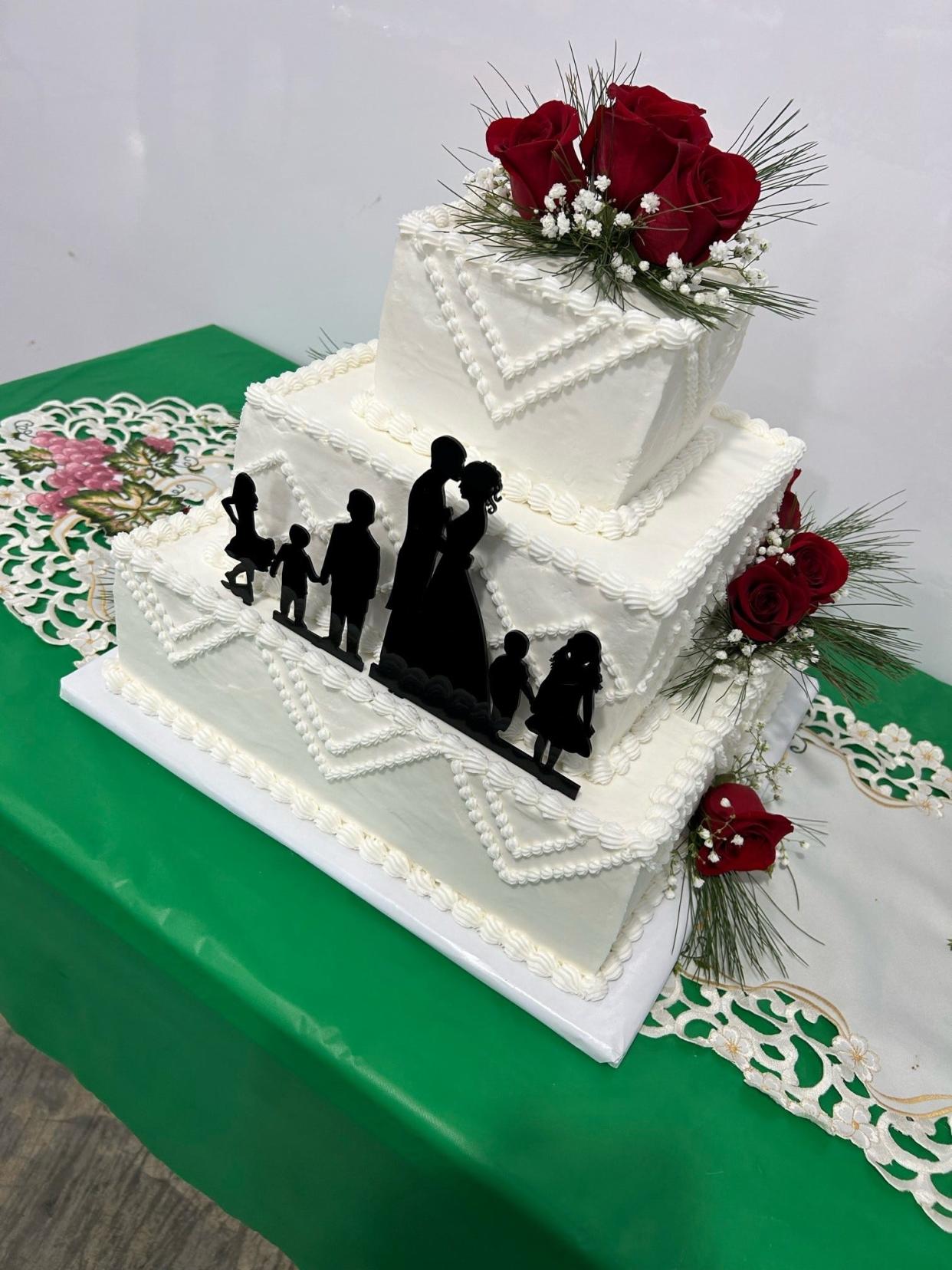 A beautiful wedding cake to celebrate the marriage of Susan and Ervin.