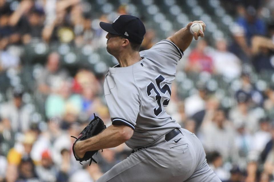 New York Yankees' Clay Holmes finishes a baseball game pitching during the ninth inning against the Milwaukee Brewers, Sunday, Sept. 18, 2022, in Milwaukee. (AP Photo/Kenny Yoo)