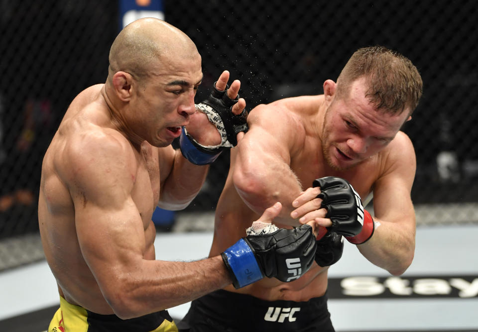 ABU DHABI, UNITED ARAB EMIRATES - JULY 12: (R-L) Petr Yan of Russia elbows Jose Aldo of Brazil in their UFC bantamweight championship fight during the UFC 251 event at Flash Forum on UFC Fight Island on July 12, 2020 on Yas Island, Abu Dhabi, United Arab Emirates. (Photo by Jeff Bottari/Zuffa LLC)