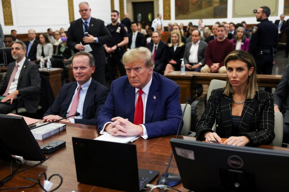 President Donald Trump, with lawyers Christopher Kise and Alina Habba, at the closing arguments for the New York civil fraud trial in January 2024 (AP)