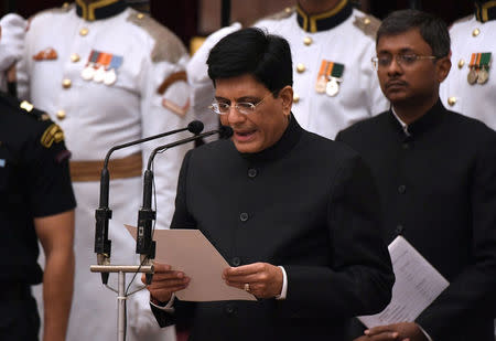 India's ruling Bharatiya Janata Party (BJP) politician and member of parliament Piyush Goyal takes the oath during the swearing-in ceremony of new ministers at the Presidential Palace in New Delhi, India, September 3, 2017. REUTERS/ Prakash Singh/Pool