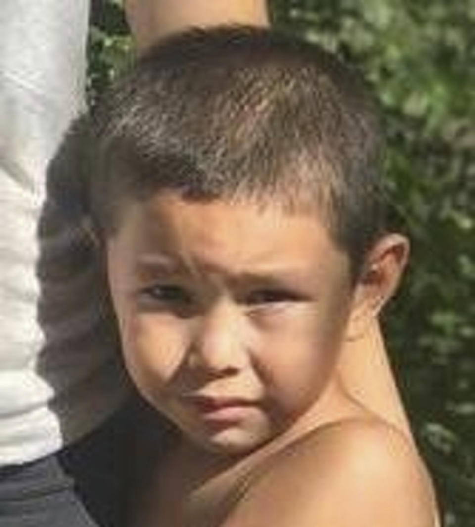 This undated photo released by the Phoenix Police Department on Saturday, Sept. 1, 2018 shows missing child Jonathan Nunez-Coronado, 5, 3'06" tall, 45 pounds, with black hair and brown eyes. An Amber Alert has been issued for Jonathan and his brother, Victor, and their father, Dimas Coronado, missing since the boys' mother and a male housemate were found fatally shot in the Phoenix home where police said the victims and boys lived. (Phoenix Police Department via AP)