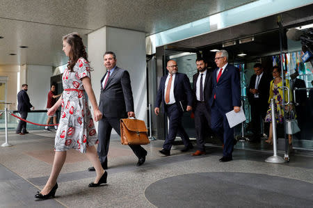 Turkish Deputy Foreign Minister Sedat Onal (2nd L) leaves after a meeting with U.S. Deputy Secretary of State John Sullivan at State Department in Washington, U.S., August 8, 2018. REUTERS/Yuri Gripas