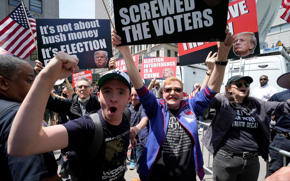 May 20, 2024: Anti-Trump protesters demonstrate outside Manhattan Criminal Court during the trial of former US President Donald Trump. Donald Trump's trial on charges of covering up hush money payments to a porn star enters its closing stages Monday with the door still open to the former president taking the stand.