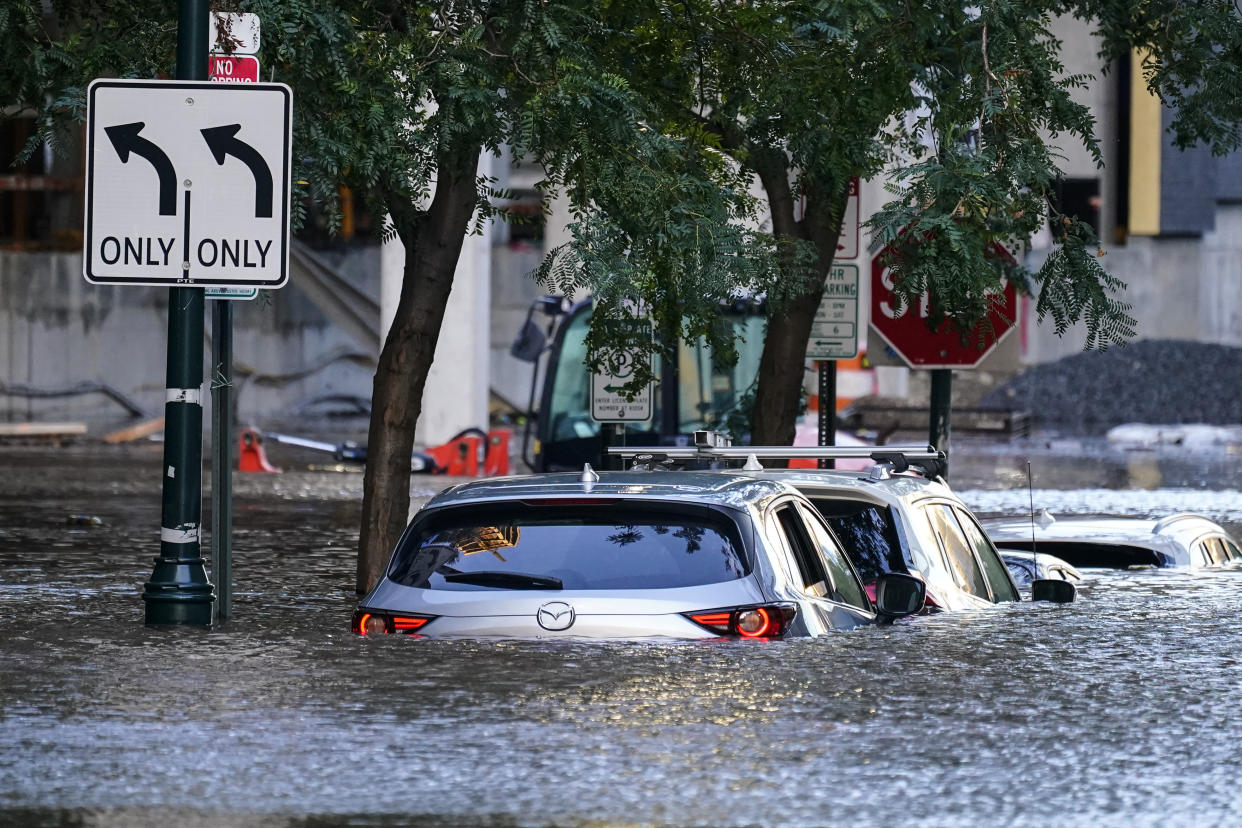 Philadelphia streets with half-submerged cars on Thursday, after the tail end of Hurricane Ida hit.