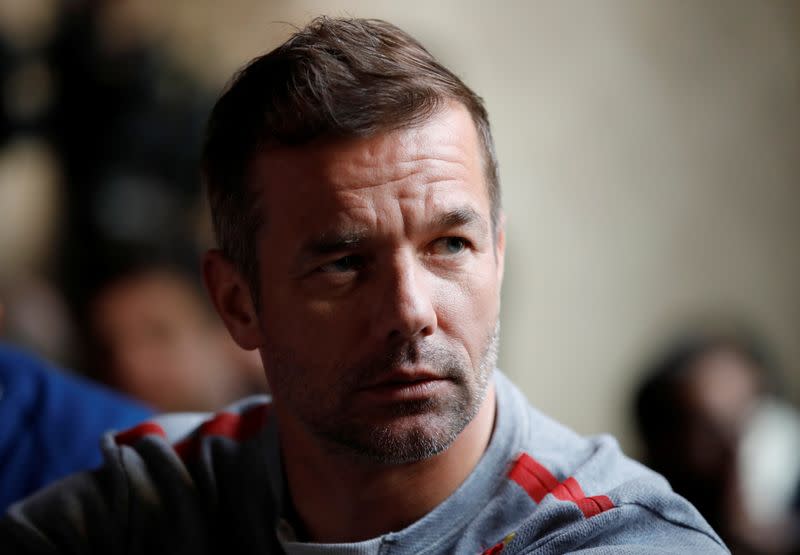 Driver Sebastien Loeb of France attends a news conference to present the 2019 Dakar Rally in Paris