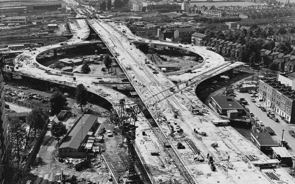 Building work in progress on three levels at the Latimer Road interchange with the Western Avenue extension at its junction with the proposed West Cross Route. This section of elevated motorway will link Marylebone Road with Western Avenue at Westway, near White City Stadium (top left). (Photo by © Hulton-Deutsch Collection/CORBIS/Corbis via Getty Images)  - Getty