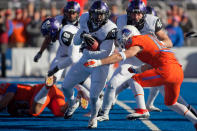 BOISE, ID - NOVEMBER 12: Waymon James #32 of the TCU Horned Frogs runs the ball against the Boise State Broncos at Bronco Stadium on November 12, 2011 in Boise, Idaho. (Photo by Otto Kitsinger III/Getty Images)