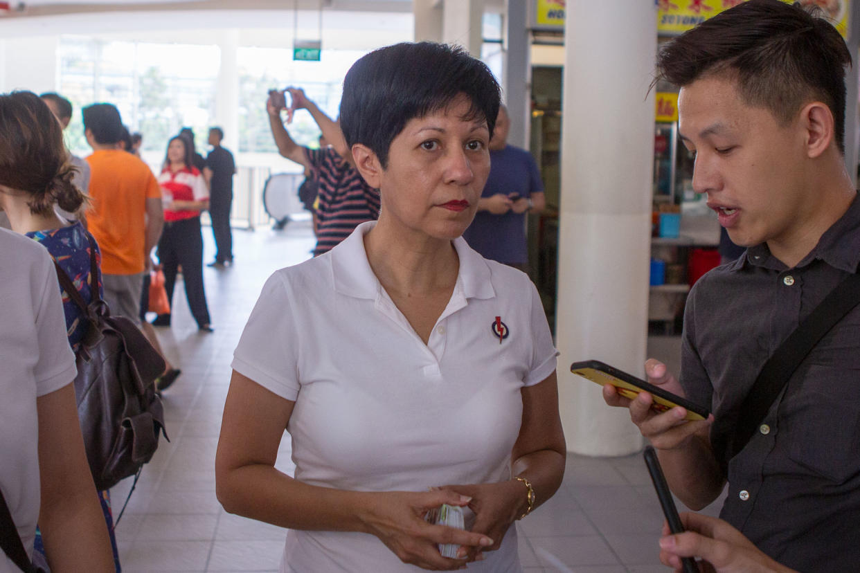 Tanjong Pagar GRC MP Indranee Rajah speaking to the media at Tiong Bahru Food Centre on Sunday (29 September). (PHOTO: Dhany Osman / Yahoo News Singapore)