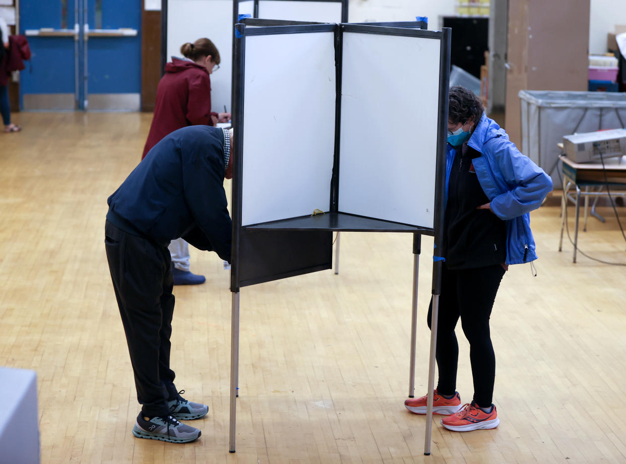 Voters cast their ballots in Boston