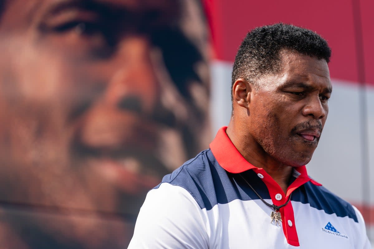 Herschel Walker is in a very close race with Democrat Raphael Warnock (Getty Images)