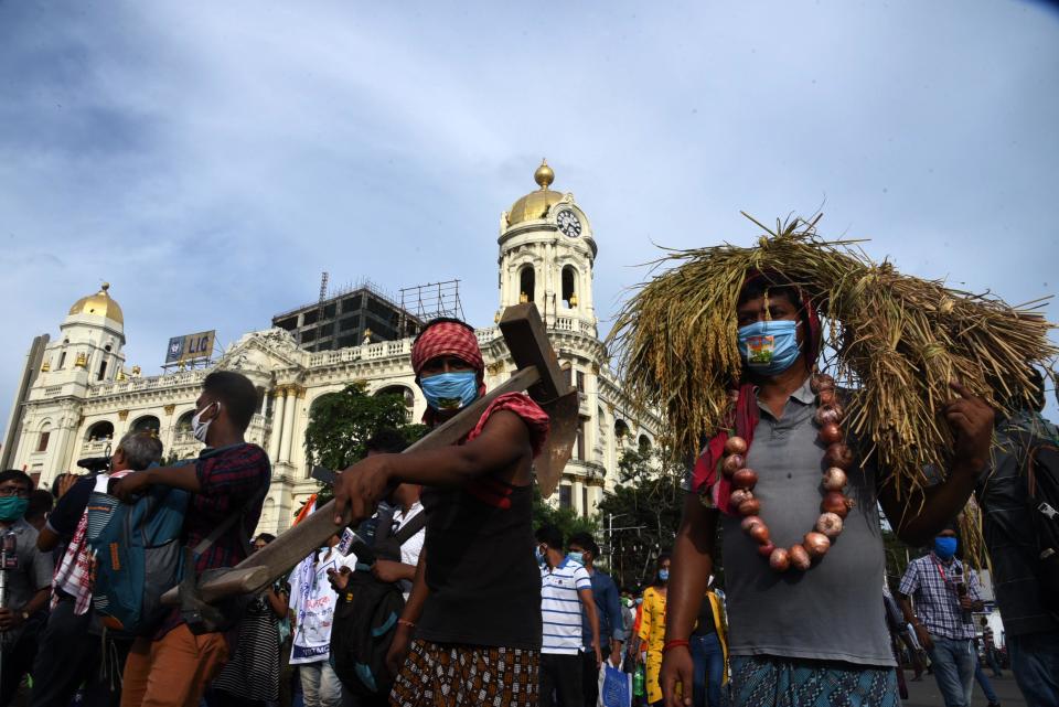 Indian farmers take part in a rally to protests against the new agriculture bills passed by the central government at Parliament in Kolkata, India on 23rd September, 2020. (Photo by Sonali Pal Chaudhury/NurPhoto via Getty Images)