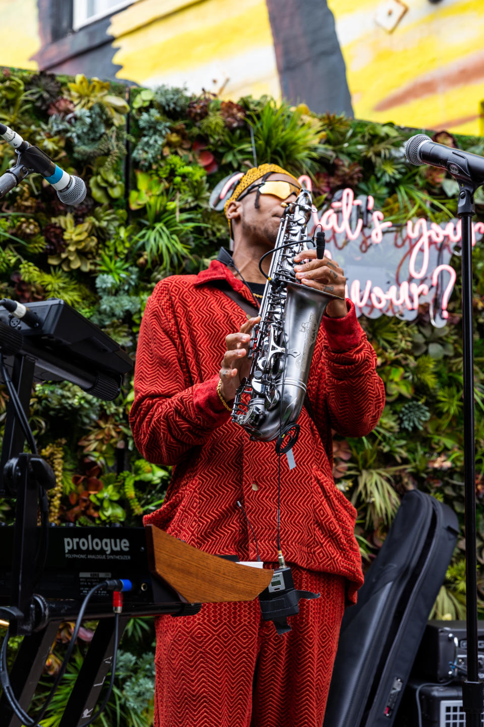 Masego playing the saxaphone