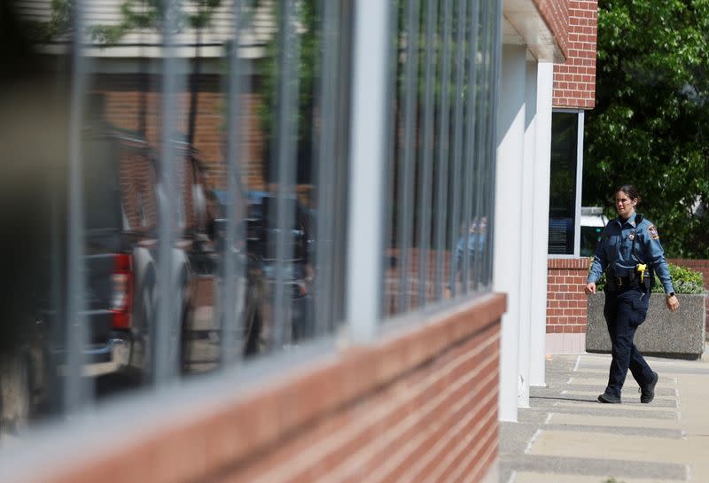 A police cruiser sits outside the office of U.S. Rep. Gerry Connolly after baseball bat attack on his staff in Fairfax, Virginia