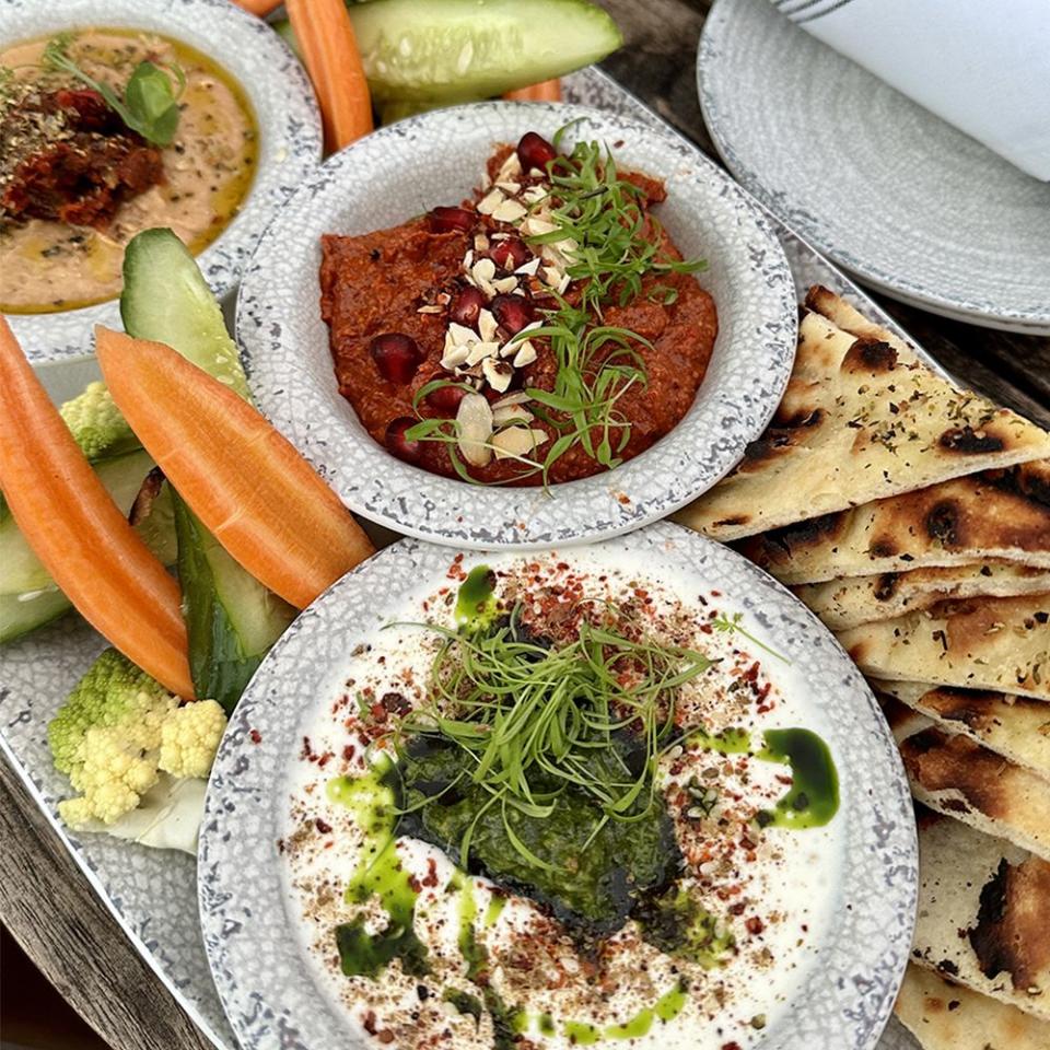 a group of plates with food on it