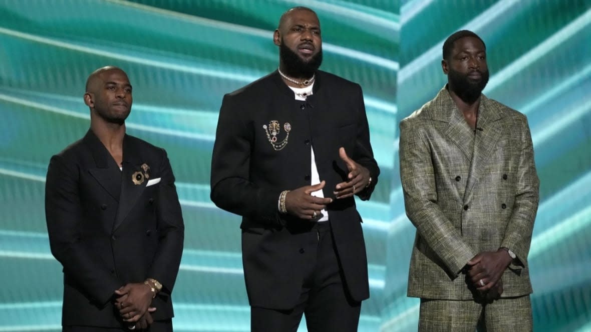 (From left) Chris Paul, LeBron James and Dwyane Wade do a tribute to Carmelo Anthony at The ESPY Awards on Wednesday, July 12, 2023, at the Dolby Theatre in Los Angeles. (Photo: Mark Terrill/AP)