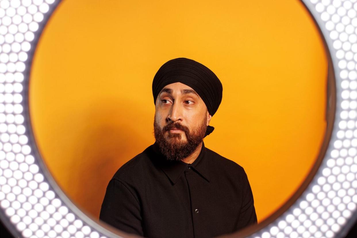 Jasmeet Raina, formerly known for posting YouTube confessionals and sketches under the username Jus Reign, has a new TV series premiering Friday on Crave. (Evan Mitsui/CBC)