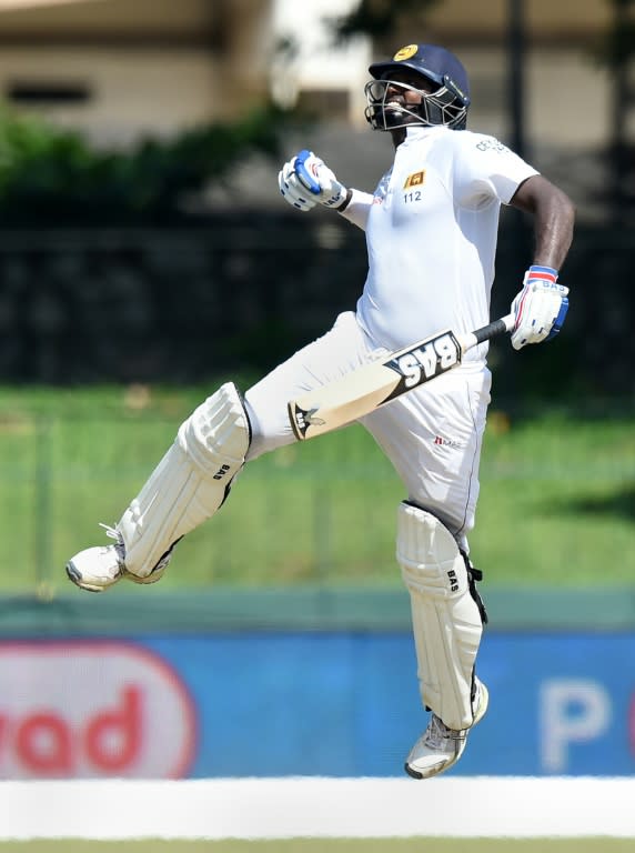 Sri Lankan captain Angelo Mathews reaches his century during the final day of the third Test against India in Colombo on September 1, 2015