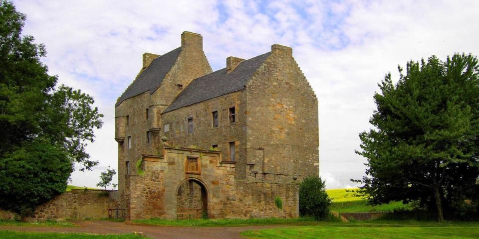 <p><strong><strong>You'll recognise it as:</strong> </strong>Lallybroch</p><p>Also known as Broch Tuarach in the show, the exteriors of this <a rel="nofollow noopener" href="https://www.tripadvisor.co.uk/Attraction_Review-g4049419-d10513614-Reviews-Midhope_Castle-South_Queensferry_Edinburgh_Scotland.html" target="_blank" data-ylk="slk:15th century castle;elm:context_link;itc:0;sec:content-canvas" class="link ">15th century castle</a> stand in for Jamie's home in the series. While exteriors are intact, the building is derelict inside. To visit, you'll need to obtain a <a rel="nofollow noopener" href="http://hopetoun.co.uk/estate/outlander-at-hopetoun/" target="_blank" data-ylk="slk:special vehicle pass;elm:context_link;itc:0;sec:content-canvas" class="link ">special vehicle pass</a> from Hopetoun Estate. </p>