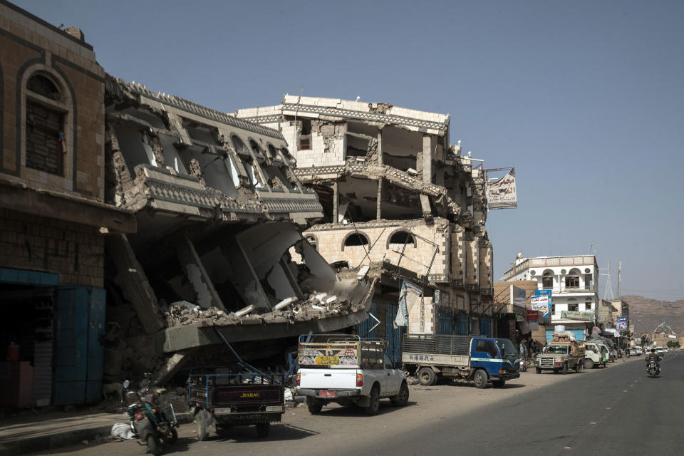 <p>Saada City, Yemen, April 23, 2017: Buildings damaged by airstrikes on the main street in Saada, the main Houthi stronghold in Yemen. (Photograph by Giles Clarke for UN OCHA/Getty Images) </p>