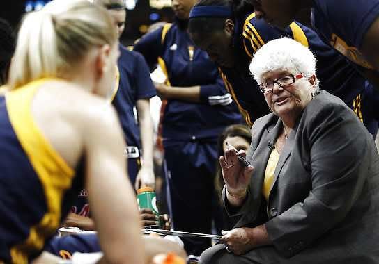 Indiana Fever head coach Lin Dunn talks to her team during a timeout against the Minnesota Lynx in the second half of Game 1 of the WNBA basketball Finals, Sunday, Oct. 14, 2012, in Minneapolis. The Fever won 76-70. Stacy Bengs | Associated Press