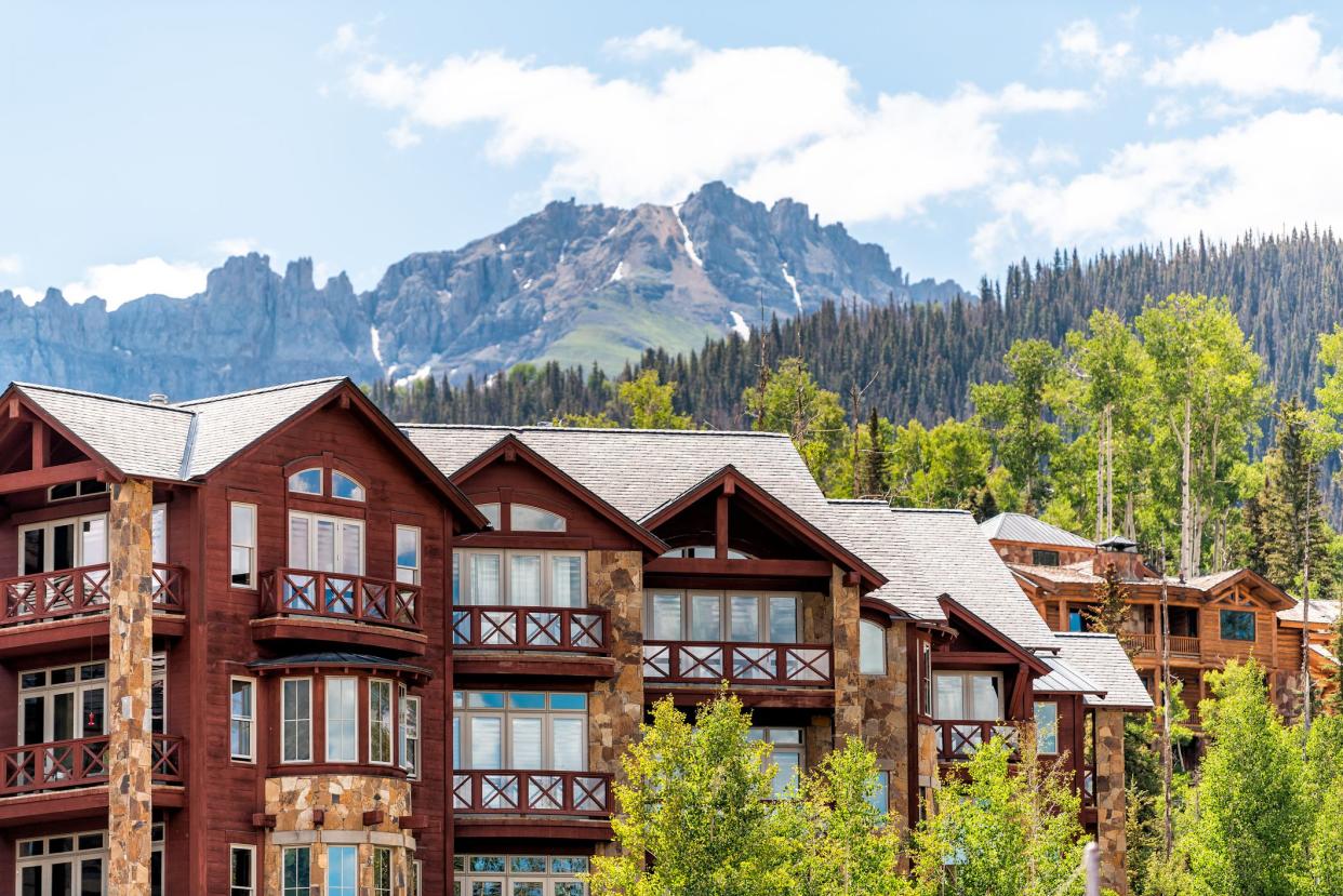 Telluride, Colorado small town Mountain Village in summer 2019 with view of San Juan Mountains and modern resort lodge apartment condo architecture