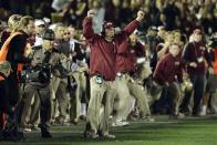 Jan 6, 2014; Pasadena, CA, USA; Florida State Seminoles head coach Jimbo Fisher celebrates with his coaches and team as time expires in the fourth quarter of the 2014 BCS National Championship game against the Auburn Tigers at the Rose Bowl. Mandatory Credit: Robert Hanashiro-USA TODAY Sports