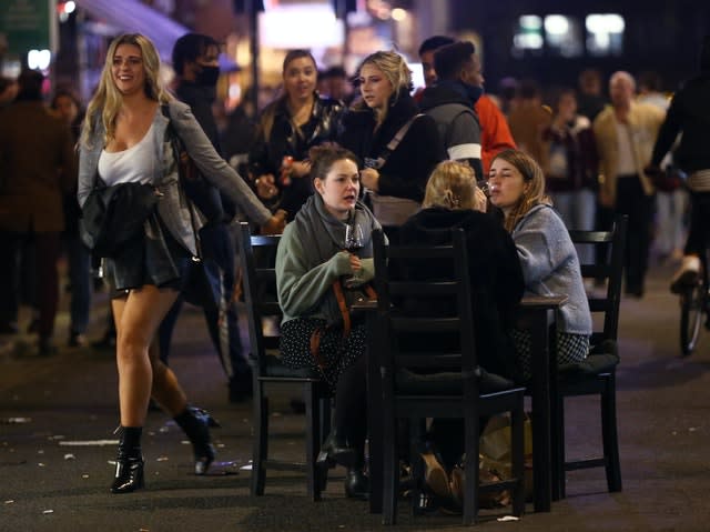 Customers outside London pub