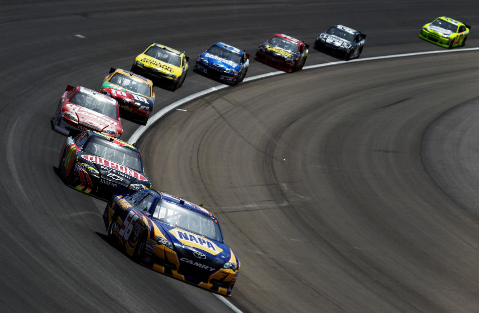 LAS VEGAS, NV - MARCH 11: Martin Truex Jr., driver of the #56 NAPA Auto Parts Toyota, leads a group of cars during the NASCAR Sprint Cup Series Kobalt Tools 400 at Las Vegas Motor Speedway on March 11, 2012 in Las Vegas, Nevada. (Photo by Todd Warshaw/Getty Images for NASCAR)