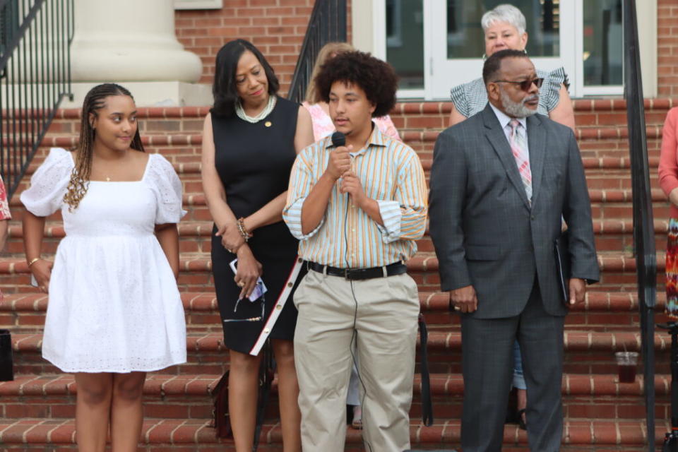  Briana Brown and AD Carter speaking in front of the Shenandoah County Circuit Court on June 11, 2024 (Nathaniel Cline/Virginia Mercury)