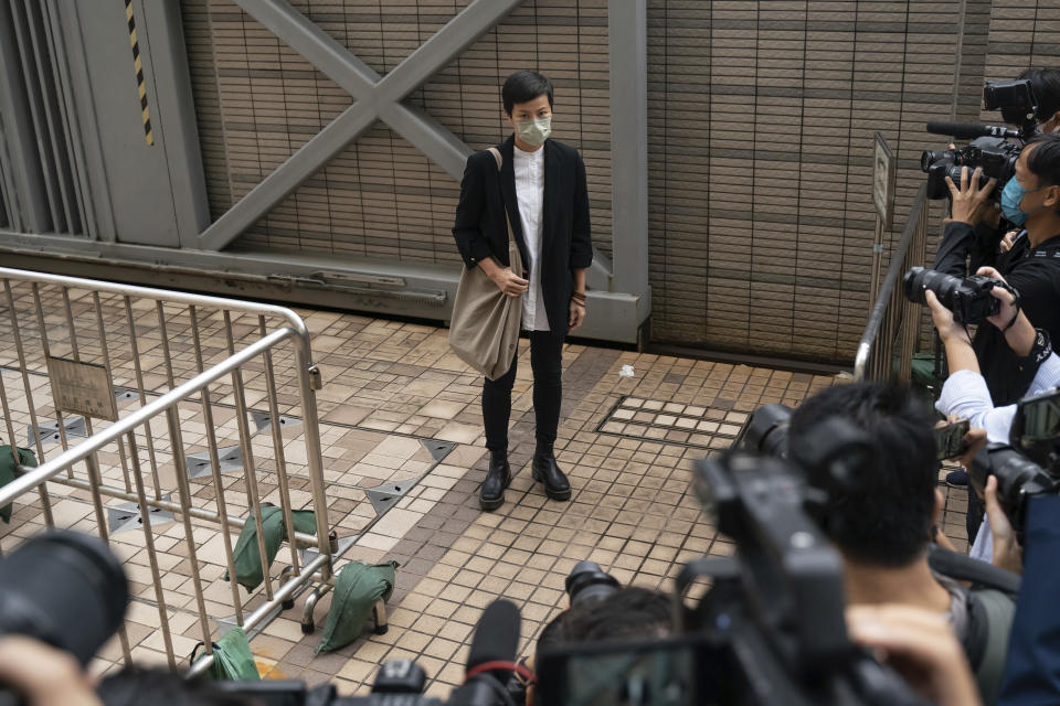 Hong Kong singer Denise Ho arrives at the West Kowloon Magistrates's Courts in Hong Kong, Friday Nov. 25, 2022. Hong Kong Cardinal Joseph Zen and five others were in court on Friday over charges of failing to register a now-defunct fund that aimed at helping people arrested in the widespread protests three years ago. (AP Photo/Anthony Kwan)