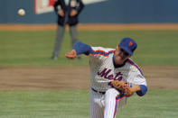 FILE - In this April 5, 1983, file photo, New York Mets pitcher Tom Seaver throws against the Philadelphia Phillies during an Opening Day baseball game at Shea Stadium in New York. To baseball fans, opening day is an annual rite of spring that evokes great anticipation and warm memories. This year's season was scheduled to begin Thursday, March 26, 2020, but there will be no games for a while because of the coronavirus outbreak. (AP Photo/Richard Drew, File)