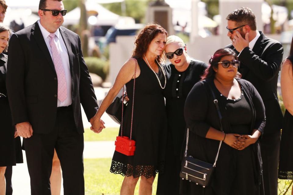 Daughters Sidney McCain, Meghan McCain and Bridget McCain(right) follow the casket of their father, U.S. Sen. John McCain, for his memorial service at the Arizona State Capitol