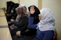 Palestinian brides attend marriage counseling class at the Islamic University in Gaza City January 19, 2016. REUTERS/Suhaib Salem