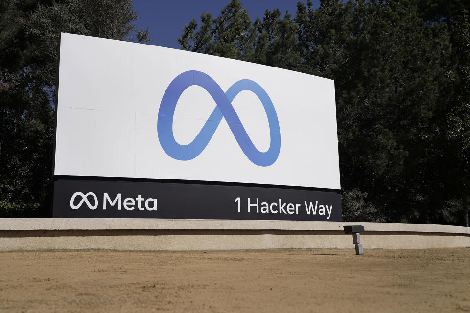 FILE - Facebook's Meta logo sign is seen at the company headquarters in Menlo Park, Calif., on, Oct. 28, 2021. Officials at Meta say they have found and disabled a network of thousands of fake Facebook accounts linked to China that were used to spread partisan content in the U.S. The accounts disclosed on Nov. 30, 2023, were designed to look like they were run by everyday Americans. (AP Photo/Tony Avelar, File)