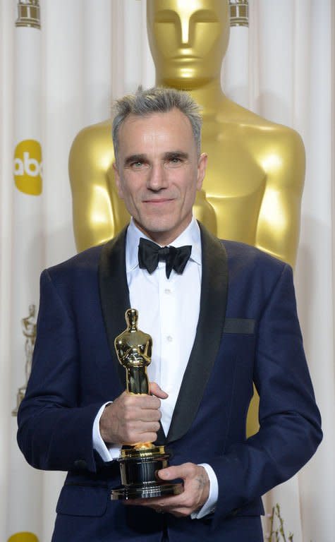 Daniel Day-Lewis holds his Best Actor Award during the Oscars on February 24, 2013 in Hollywood, California