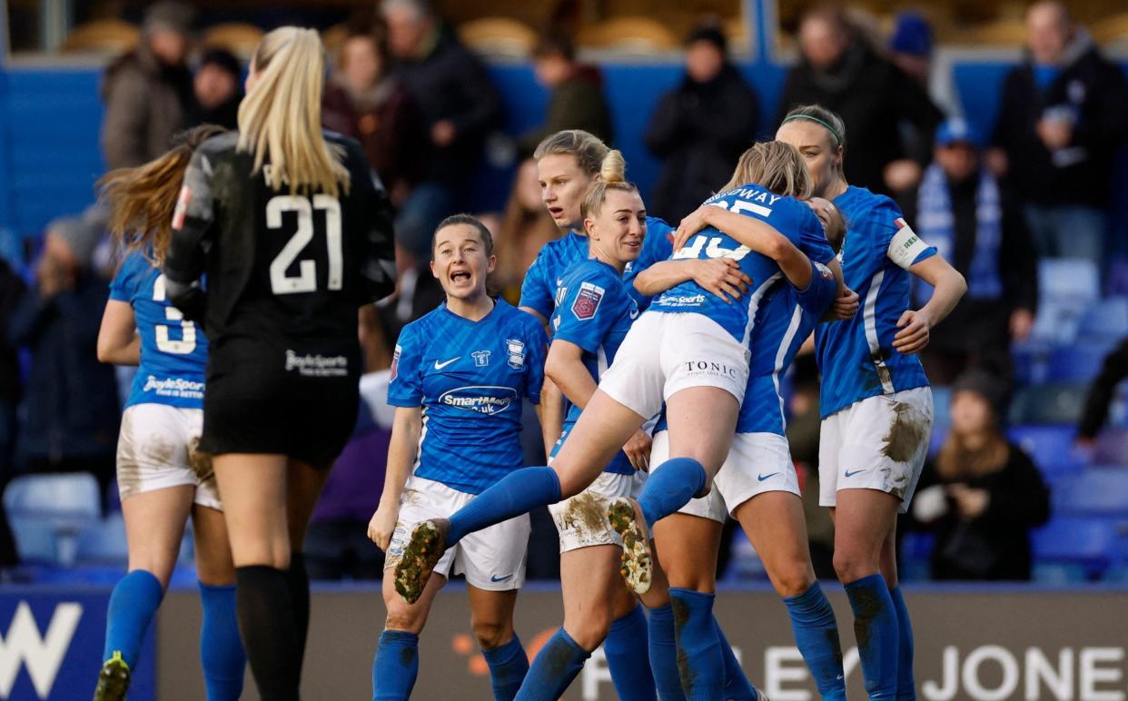 Birmingham City players celebrate after the match. - REUTERS