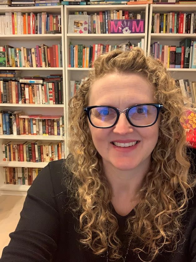 The author in her office with her books. 