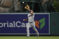 Cleveland Guardians center fielder Ramon Laureano (10) catches a line drive hit by Los Angeles Angels' Kyren Paris during the fifth inning of a baseball game in Anaheim, Calif., Friday, Sept. 8, 2023. (AP Photo/Ashley Landis)