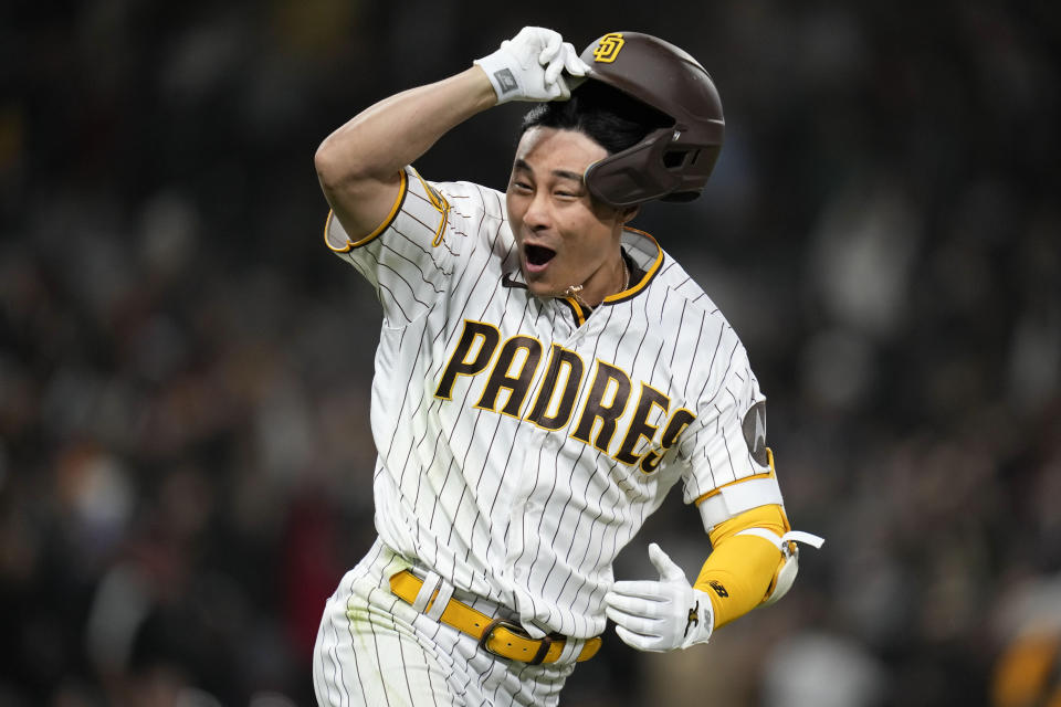 San Diego Padres' Ha-Seong Kim celebrates after hitting a walk-off home run during the ninth inning of a baseball game against the Arizona Diamondbacks, Monday, April 3, 2023, in San Diego. (AP Photo/Gregory Bull)