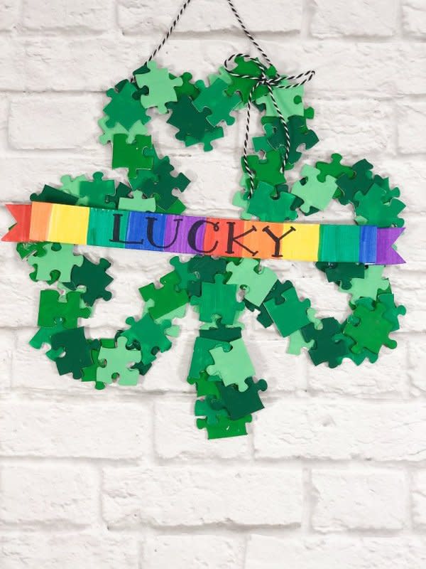 <p>Creatively Beth</p><p>Have some puzzles around the house with missing pieces? Upcycle the incomplete puzzle (or buy a new one at the local dollar store) to create this gorgeous lucky shamrock wreath from <a href="https://creativelybeth.com/upcycle-a-lucky-shamrock-wreath-from-puzzle-pieces/" rel="nofollow noopener" target="_blank" data-ylk="slk:Creatively Beth;elm:context_link;itc:0;sec:content-canvas" class="link rapid-noclick-resp">Creatively Beth</a>.</p>