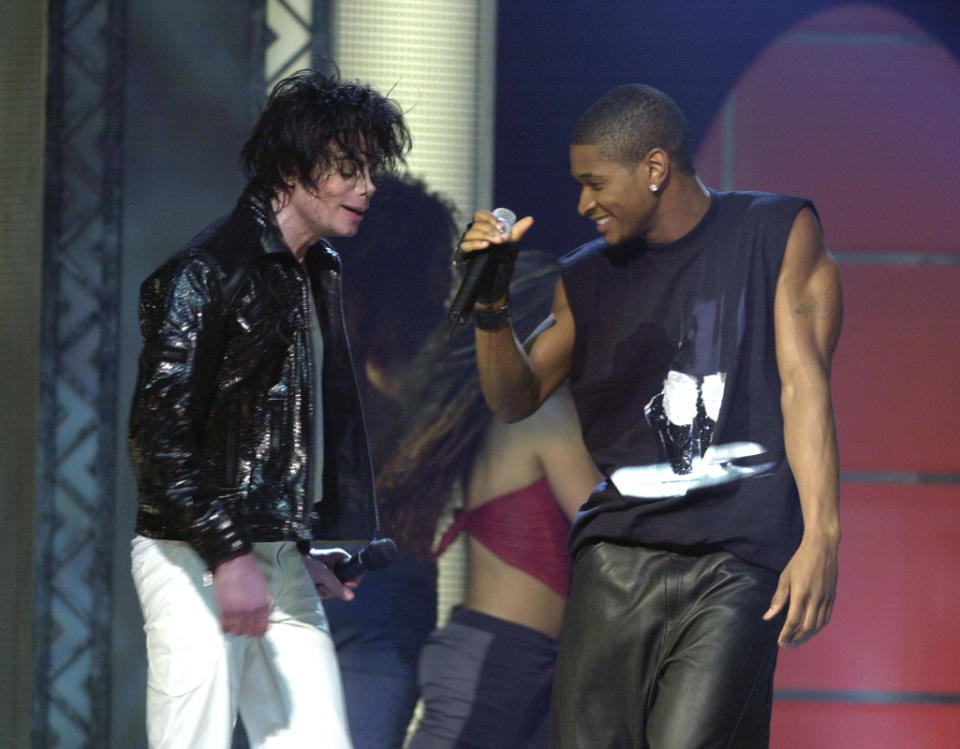 Michael Jackson and Usher<p>Kevin Kane/WireImage</p>