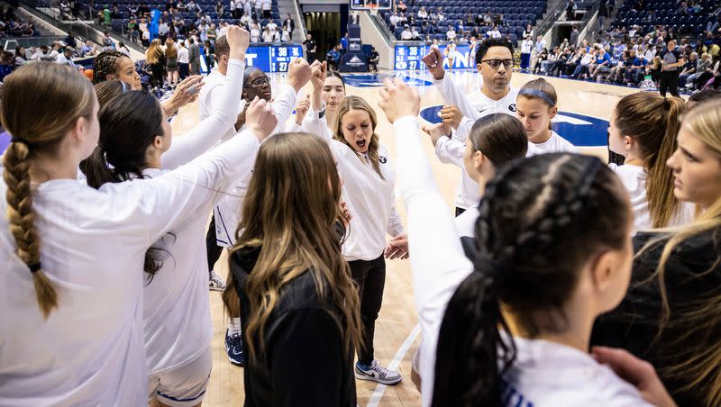 BYU women’s basketball coach Amber Whiting huddles up her team during game against Rice in the WNIT in Provo. The competition will get tougher this season for BYU as a member of the Big 12 Conference.