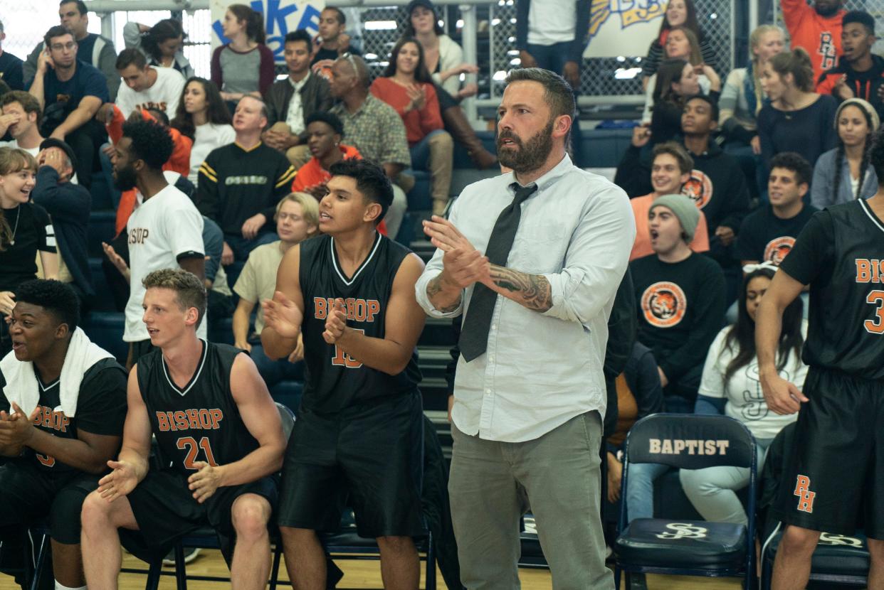 Jack Cunningham (Ben Affleck) coaches a team of scrappy youngsters at his Catholic school alma mater in 