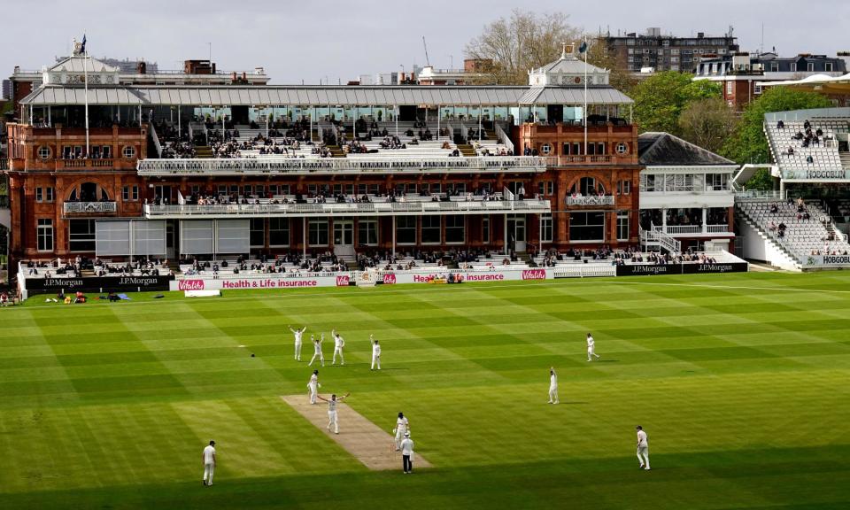 <span>Middlesex's Ryan Higgins appeals in vain for the wicket of Glamorgan's Sam Northeast, who ends the day unbeaten on 186.</span><span>Photograph: John Walton/PA</span>