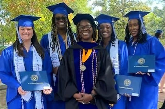 <p>Rooney Coffman - St. Andrews University Photographer</p> Dr. Dorothy Miller (center) with graduating nursing students, including daughter Chaquita Bandy (second from left)