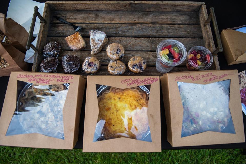 Baked goods, fresh fruit and baked quiches stand on display at The Fearless Cooking Company booth at the Goshen Farmers Market in Goshen, NY on Friday, May 20, 2022. KELLY MARSH/FOR THE TIMES HERALD-RECORD