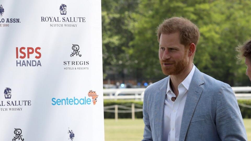 Fatherhood clearly agrees with Prince Harry.
