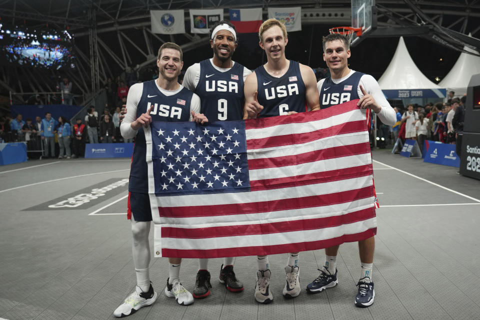 The United States team celebrates winning. the men's 3x3 basketball final match against Chile at the Pan American Games in Santiago, Chile, Monday, Oct. 23, 2023. (AP Photo/Dolores Ochoa)